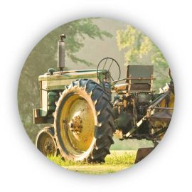 Traktor på fält ikon